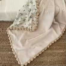 couverture bébé - Pompom - nid douillet